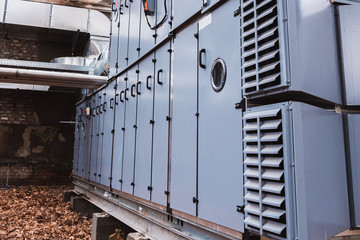 Side view of the commercial central air handling unit with cooling coil