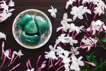 Green Aventurine with Jasmine on Dark Wood