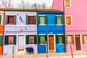 Italy, Venice, Burano, view and architectural details of the typical colored houses.
