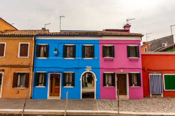 Fototapeta na wymiar Italy, Venice, Burano, view and architectural details of the typical colored houses.