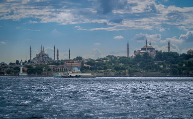 Fototapeta na wymiar Magnificent Istanbul Landscape - Blue Mosque - Hagia Sophia - passenger ferry