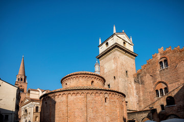 Fototapeta na wymiar MANTUA: Rotonda di San Lorenzo church and Clock tower in Mantua (Mantova). Italy