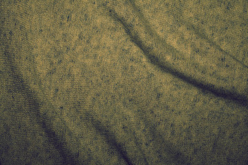 Texture of gray fibers with a rough surface, background, abstraction. Space for text. Gray material