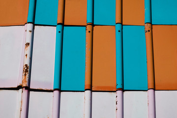 texture. color metal tile. it is made of metal. it has scratches and rust