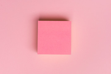 Top view flat lay picture with blank notepad page on colored surface