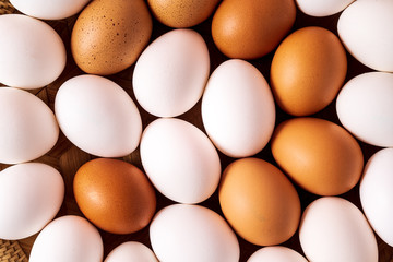 White and brown Egg pattern flat lay.