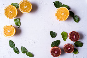 Flat lay slices of different raw fresh citrus fruit.