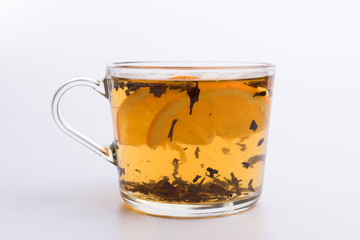 Glass cup of black tea with lemon. Isolated on white background
