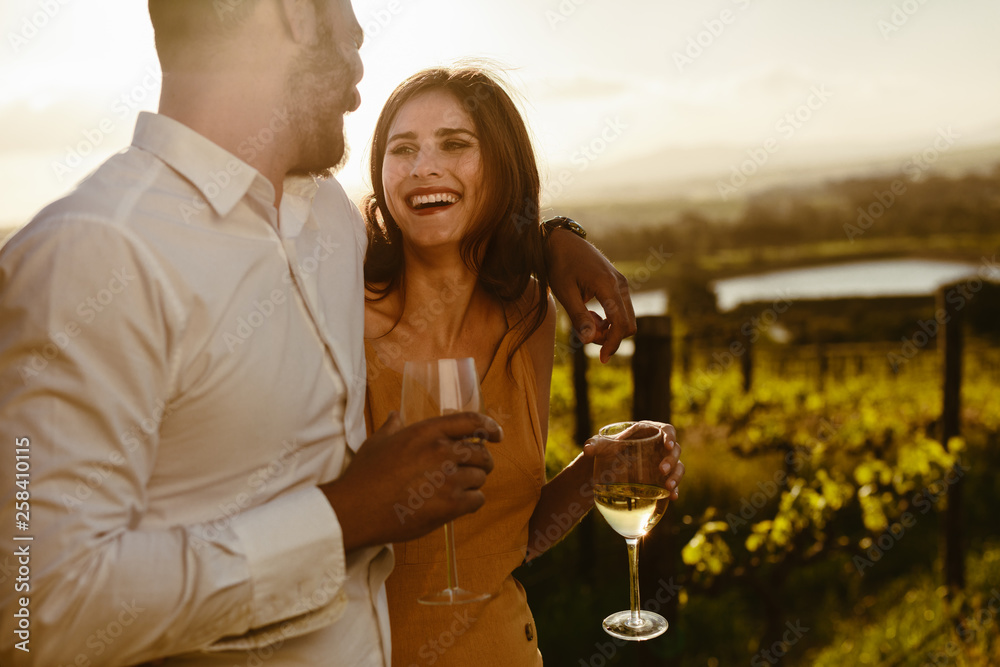 Poster Couple on a romantic date in a vineyard