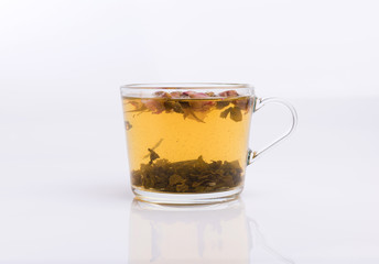 Cup of green tea isolated on white background