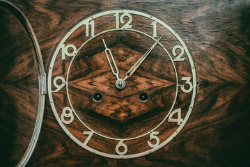 Dial of old wooden clock
