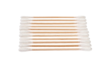 Eco-friendly materials. Wooden, cotton swabs on a white background