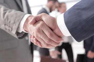 closeup.reliable handshake of business partners