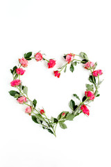 The heart is lined with red roses on white background. Valentine's background. Floral pattern. Flat...