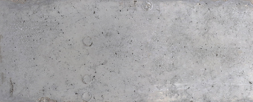 Panoramic concrete texture with formwork pattern and cracking