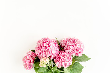 Fototapeta premium Beautiful, pink hydrangea flower on white background. Floral concept. Flat lay, top view. 