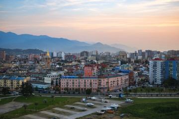 Fototapeta na wymiar View of the city at sunset. Batumi, Adjara, Georgia. Panorama Of Modern Architecture In Seafront.