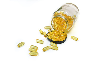 Vitamin Fish oil capsules isolated with copy space for text on white background. Supplementary food. Omega 3. Vitamin E.
