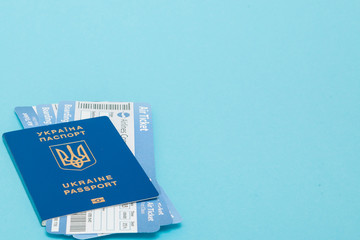 Passport and air tickets on a blue background. mockup empty blank, copy space