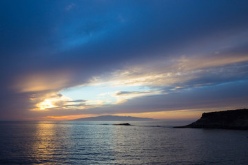 beautiful sunset over the Atlantic ocean at Costa Adaje, Tenerife Island, Spain