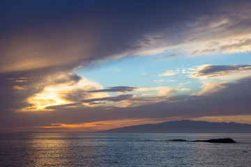 beautiful sunset over the Atlantic ocean at Costa Adaje, Tenerife Island, Spain