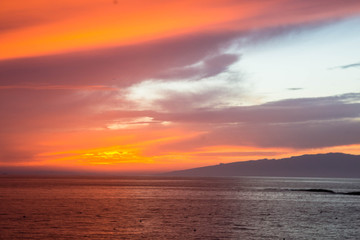 Naklejka na ściany i meble beautiful sunset over the Atlantic ocean at Costa Adaje, Tenerife Island, Spain