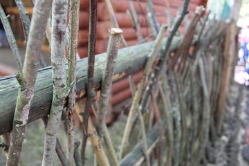 old wooden fence from branches