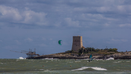 Fototapeta premium Windsurf passion in Vieste beach