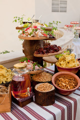 Delicious wedding reception table with snacks