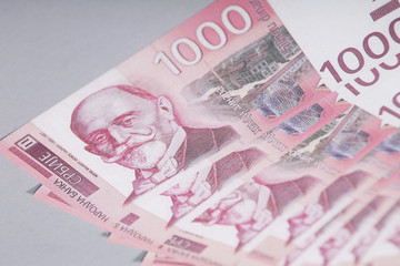 Stack of one thousand serbian dinar banknotes.