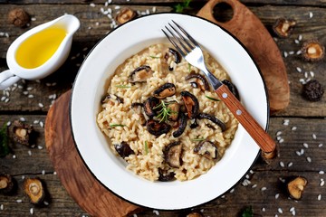 Traditional Italian risotto with dried mushrooms, parmesan cheese, vegetable broth and white wine.