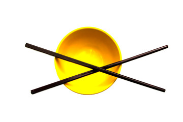 chopsticks and bowl isolated on white background