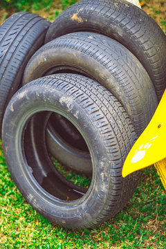 Used tyres car potentially store stagnant water and become mosquitoes breeding ground 