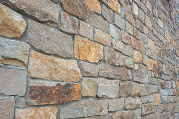 big solid stone cement wall in a perspective angle