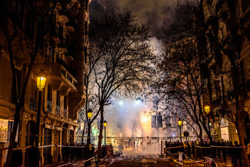 Valencia, Spain - March 19, 2019: Luminous mascletá fallera with bright and noisy firecrackers causing a lot of smoke.