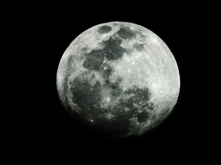 Moon surface / The Moon is an astronomical body that orbits planet Earth and is Earth's only permanent natural satellite