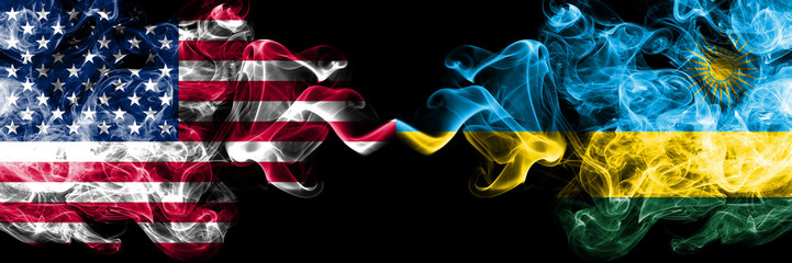 United States of America vs Rwanda, Rwandan smoky mystic flags placed side by side. Thick colored silky smoke flags of America and Rwanda, Rwandan