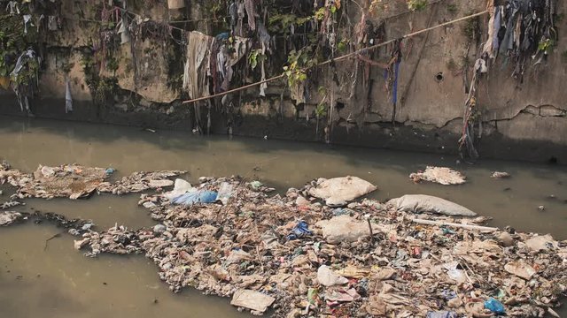 Dirty river in Dharavi slums. Mumbai. India.