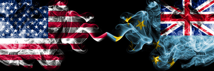 United States of America vs Tuvalu, Tuvaluan smoky mystic flags placed side by side. Thick colored...