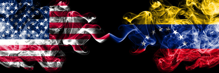 United States of America vs Venezuela, Venezuelan smoky mystic flags placed side by side. Thick colored silky smoke flags of America and Venezuela, Venezuelan