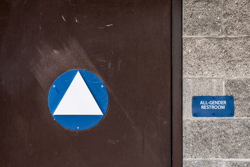 Bathroom sign for all gender bathroom in California.