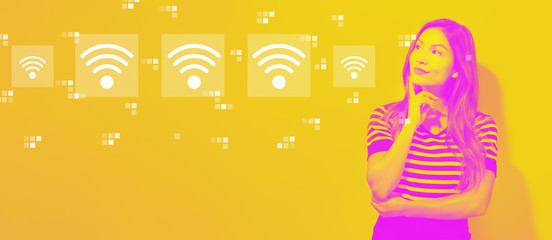 Wifi concept with young businesswoman in a thoughtful face