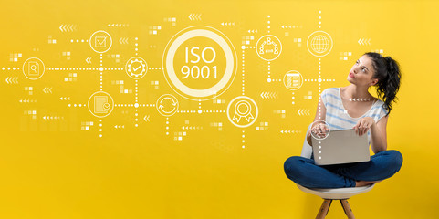 ISO 9001 with young woman using a laptop computer 