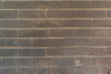 Detailed texture. Old dark brick wall. Abstract background
