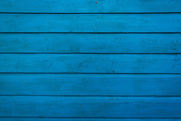 Old painted  blue wooden wall. Wood plank texture background