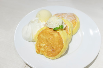 japanese style fluffy egg pancake served with vanilla icecream and cream