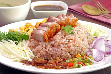 Fried rice with shrimp paste (Khao khluk Kapi) is a flavorful dish in Thai cuisine that consists of primary ingredients of fried rice mixed with shrimp paste (Kapi),  typically served as a lunch dish.
