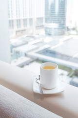 a cup of tea by the window