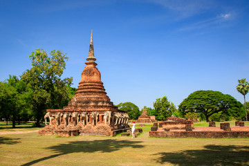 Naklejka premium Wat Chang lom which has old-style pagoda with elephant statues around sukhothai historical park in Thailand., Tourism, World Heritage Site, Civilization,UNESCO