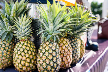 fresh pineapples on the market